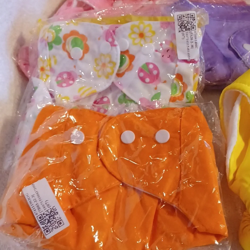 Diaper covers and liners 7 covers and 6 liners all new baby girl